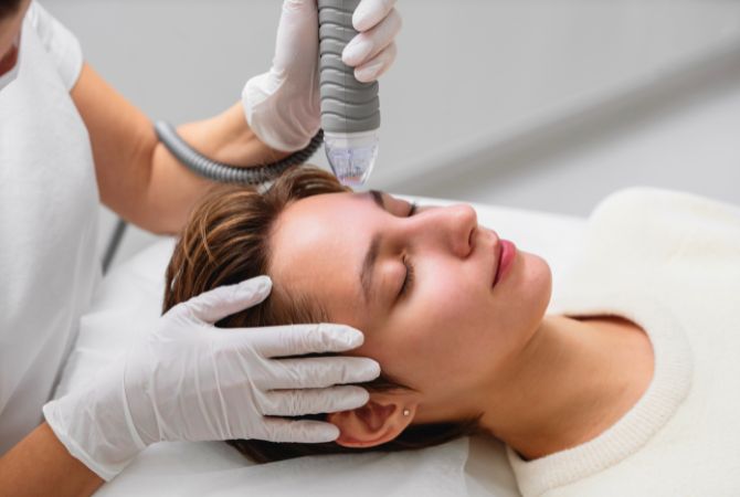 woman getting microneedling services